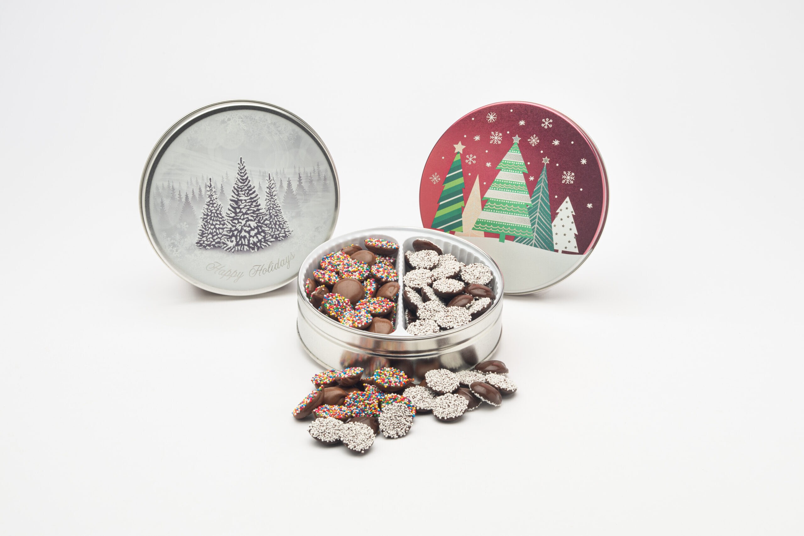 Asher's Christmas candy tins featuring Christmas nonpareils.