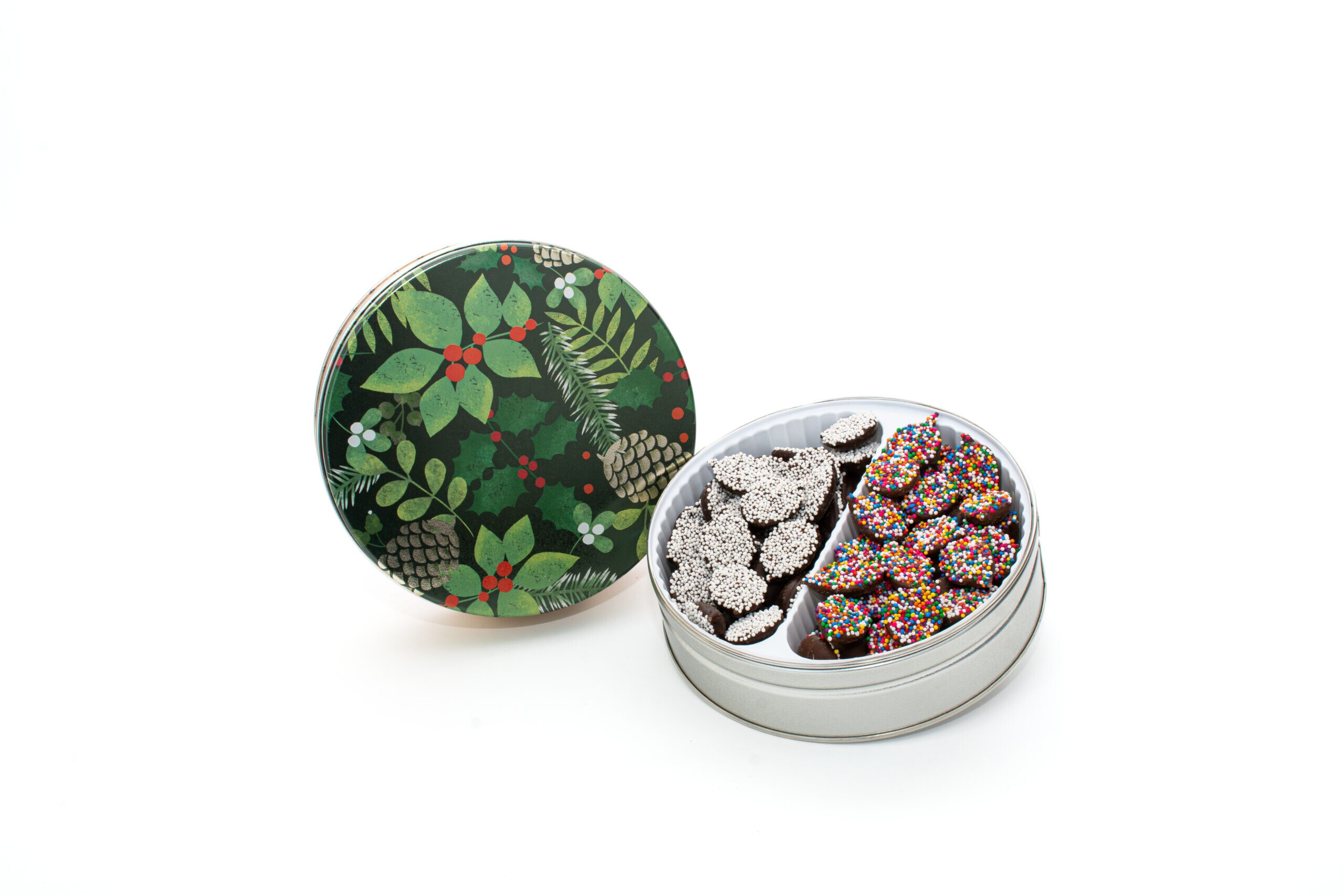 Asher's Christmas candy tins with Christmas nonpareils.