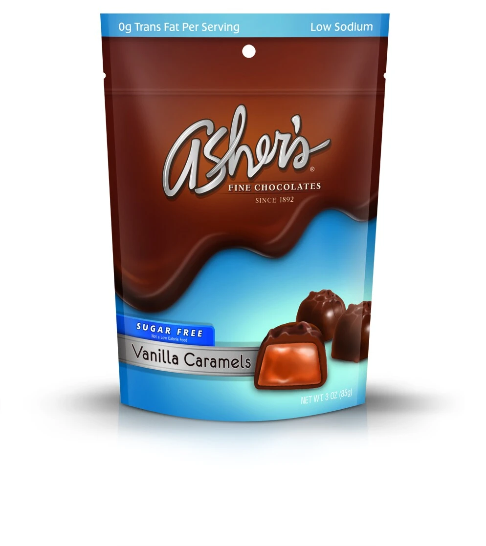 Vanilla Caramels Sugar Free 3oz Bag is brown and blue with old Asher's logo and Sugar Free label highlighted in blue. Three (3) caramels are pictured on the front of the package to show size, shape, and caramel inside.