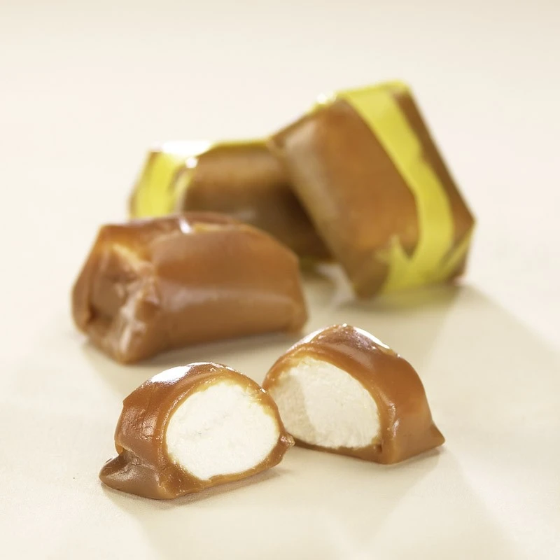 Caramel Marshmallow Puffs are clouds of soft, white marshmallow, flavored with sweet vanilla, are wrapped in sticky golden caramel. This individual wrapped piece is perfect to unwrap on the beach for instant sweet satisfaction. Don’t worry about sharing because Caramel Marshmallow Puffs are available 12-pieces per box.