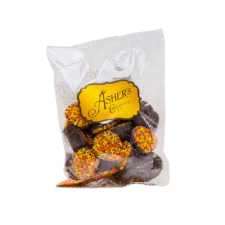 A 4 oz. bag of Ashers Chocolate Co. Dark Chocolate Fall Nonpareils features delicious chocolate candies topped with orange, yellow, and red sprinkles.