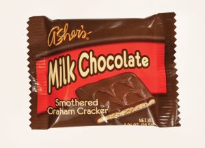 Milk Chocolate Smothered Graham Cracker individually wrapped package shown on white background.
