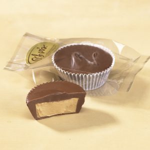 Milk Chocolate Peanut Butter Cup in clear Cello Bag with gold Asher's sticker. One (1) cup is cut open to reveal the smooth peanut butter filling.