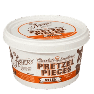 A white plastic Milk Chocolate Smothered Pretzel Pieces - 2 lb. Pail filled with milk chocolate-covered pretzel pieces.