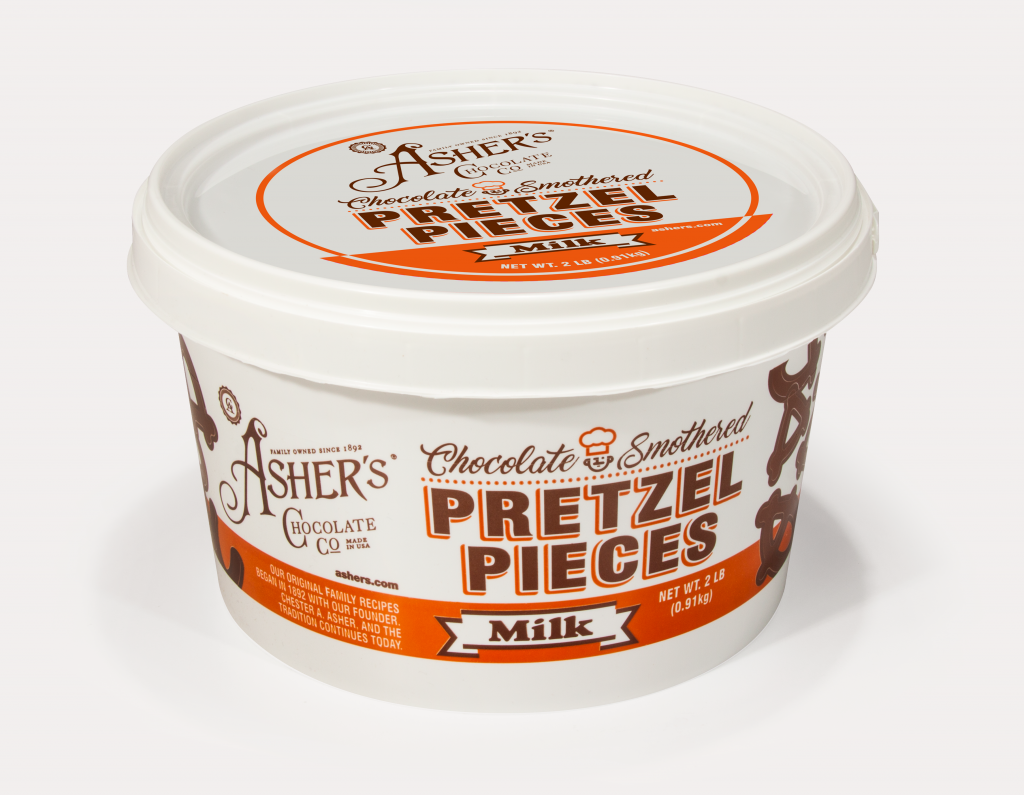 Milk Chocolate Smothered Pretzel Pieces two (2) pound white pail with brown writing, and orange detail shown on white background.