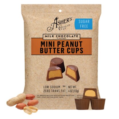 Bag of Ashers Milk Chocolate Mini Peanut Butter Cups, labeled sugar free, with images of the candy and peanuts at the bottom. The packaging highlights low sodium and zero trans fat. Net weight is 4 oz (113g).