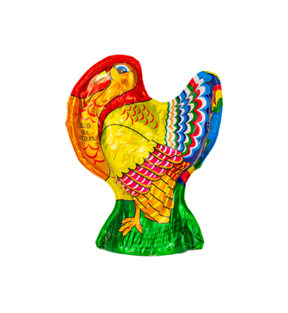 A foil-wrapped milk chocolate shaped like a colorful rooster, with vibrant red, yellow, blue, and green patterns on its body and wings.