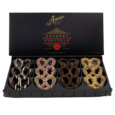 A box of Ashers Gourmet Chocolate Pretzels containing four varieties: drizzled, rainbow sprinkle, dark chocolate, and nut-covered.